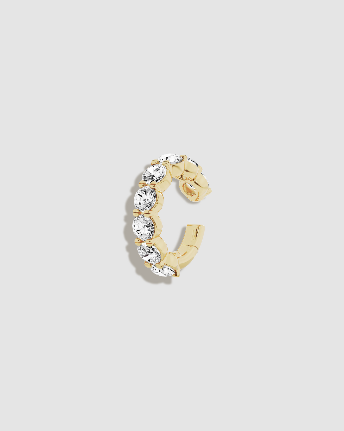 Close up image of diamond ear cuff at a slight angle
