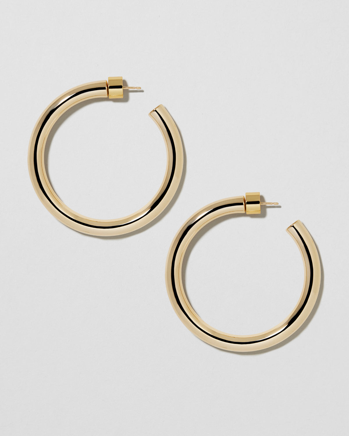 1.5" Natasha Baby Hoops earring - styled on model | gold hoop earrings