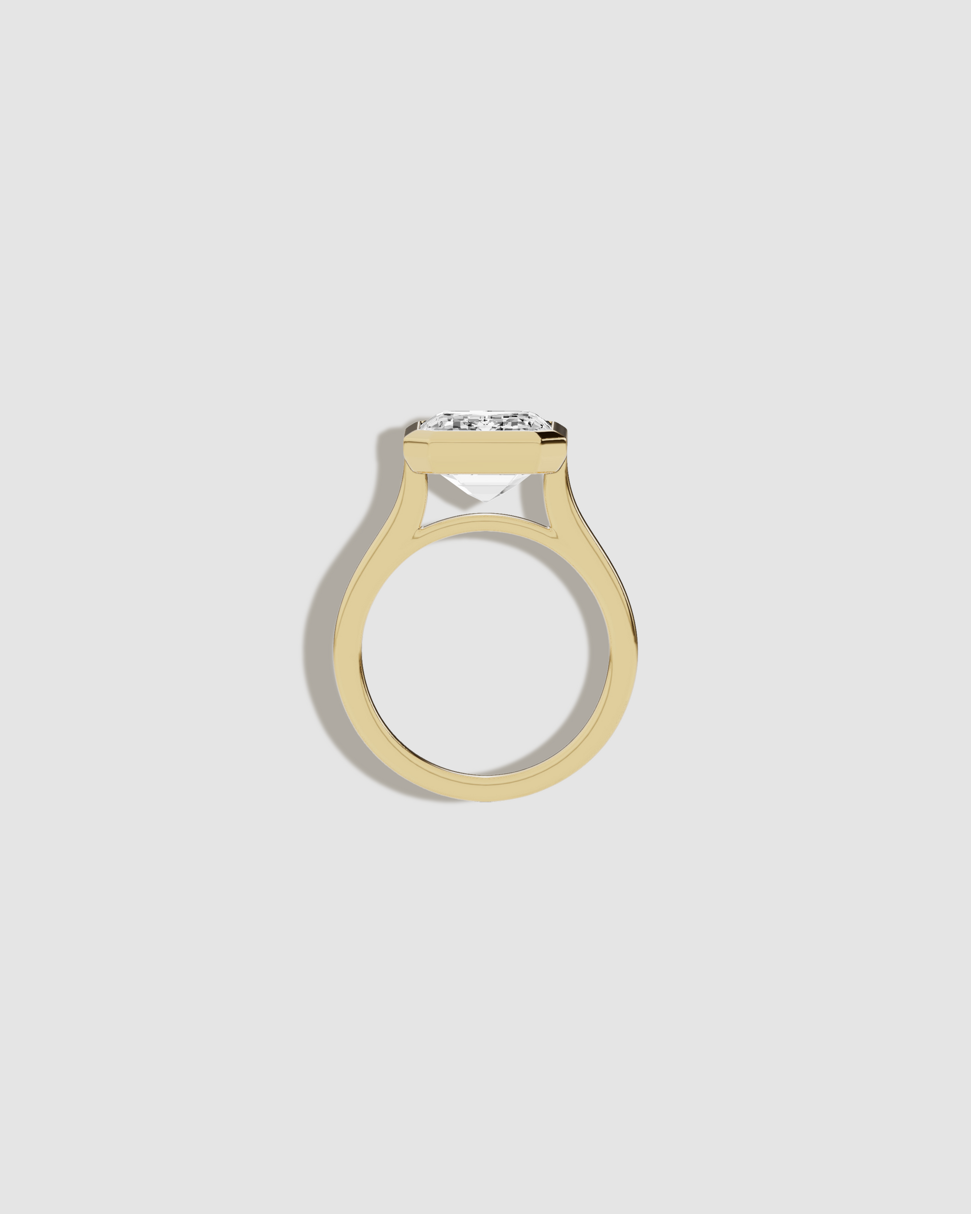 Rectangle shaped diamond on gold band flat view