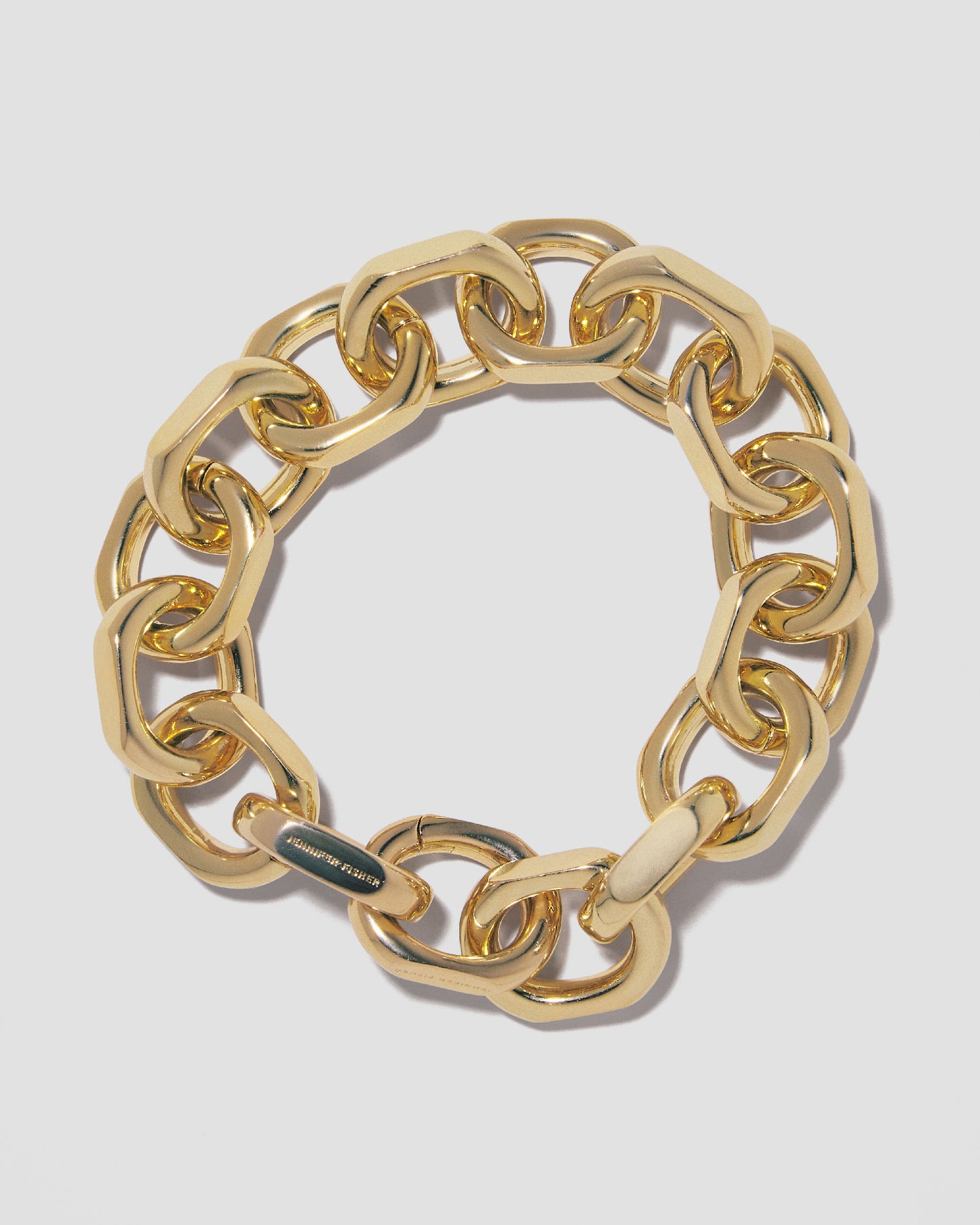 Closed bracelet on grey background.