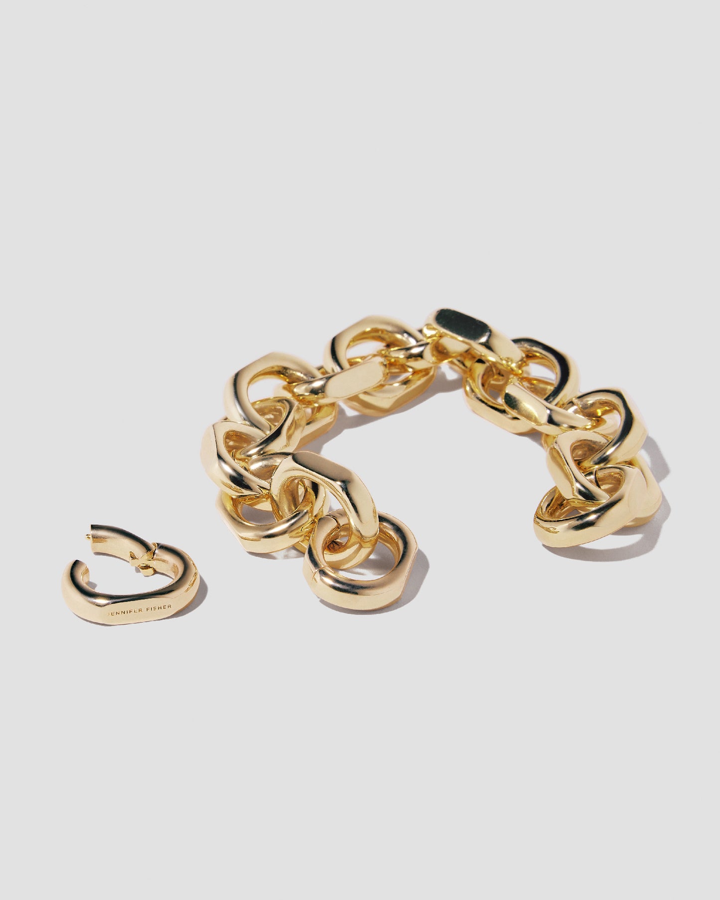 Bracelet on grey background with link off.