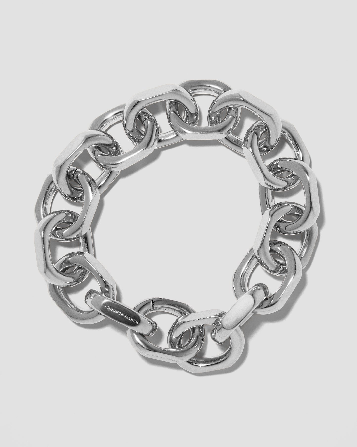 Closed bracelet on grey background.