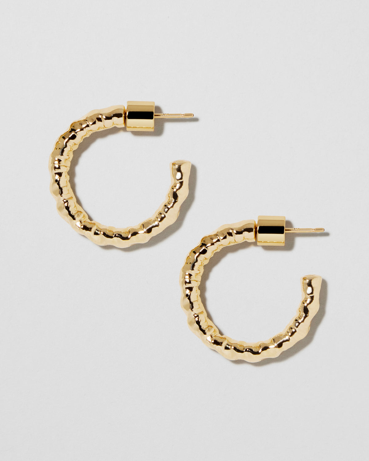 Hailey Huggies earring - styled on model | gold huggie earrings