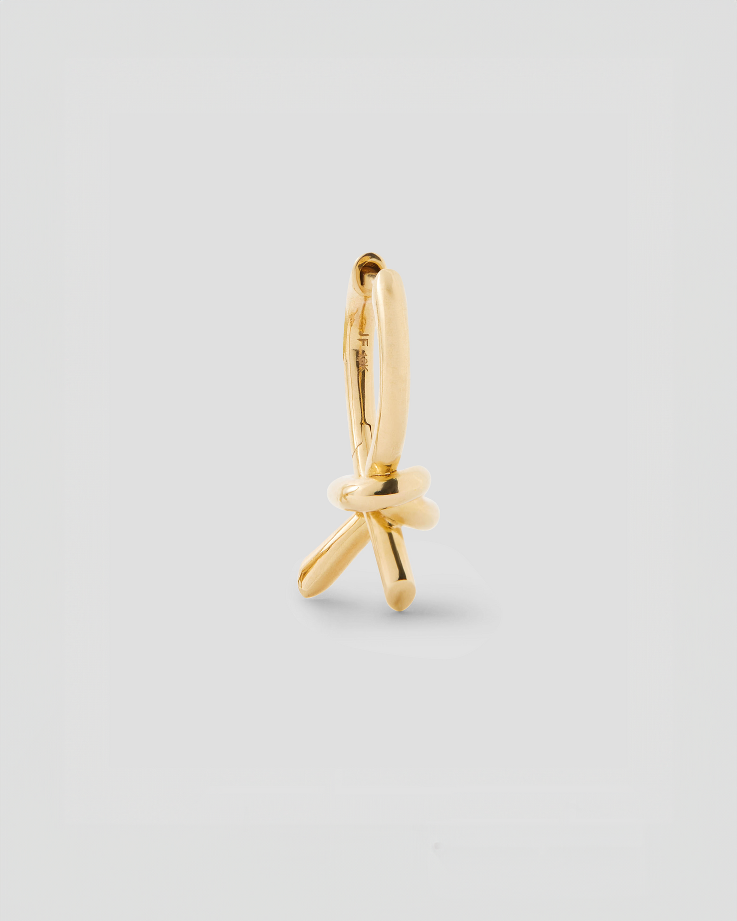 Knot Huggie in 18K Yellow Gold