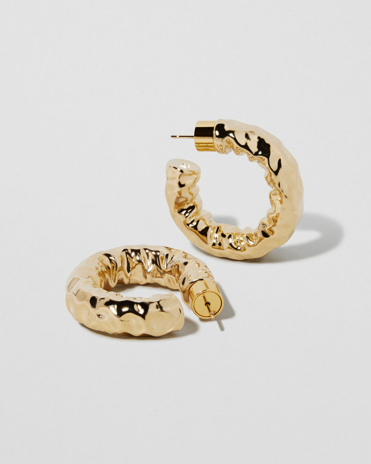 Maeve Huggies earring - alternate angle | gold huggie earrings