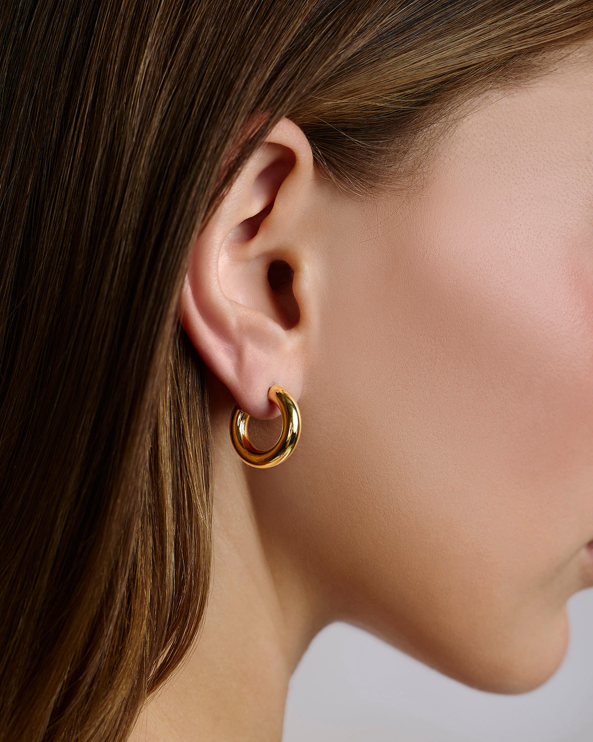 Lilly Micro Huggies earring - front view | gold hoop earrings for women