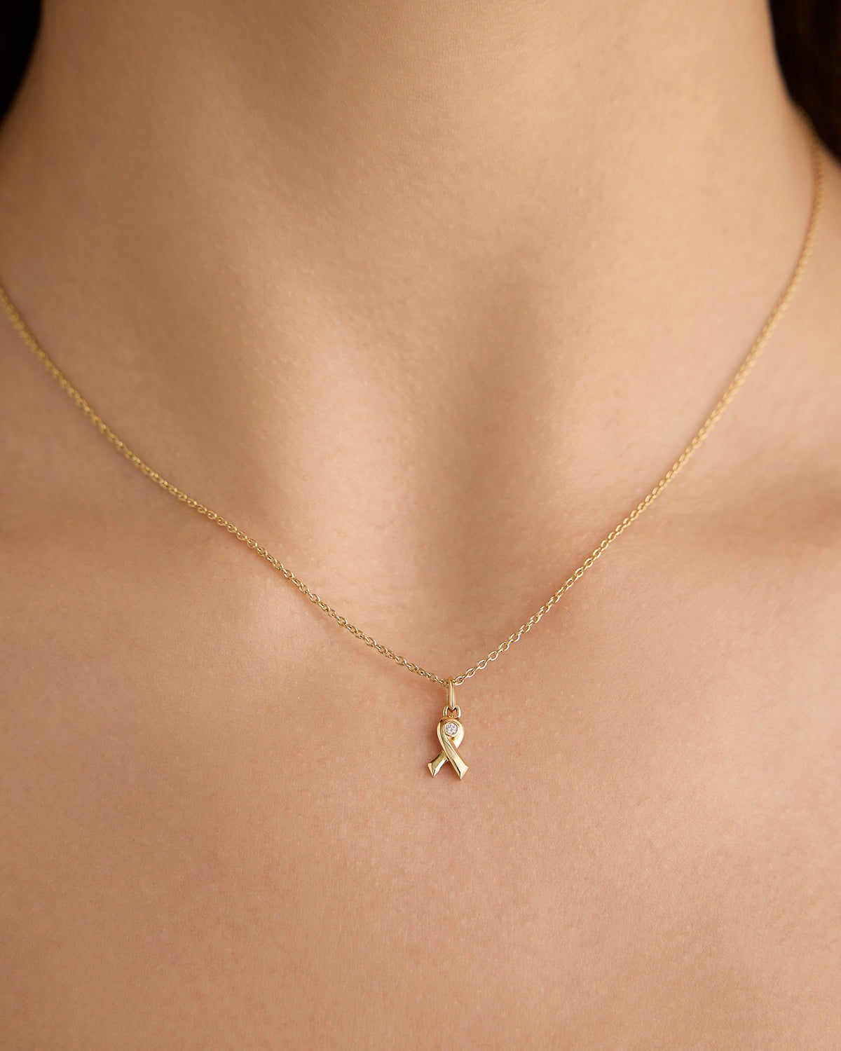 Breast Cancer Awareness Necklace charm - close-up detail | gold charm necklace