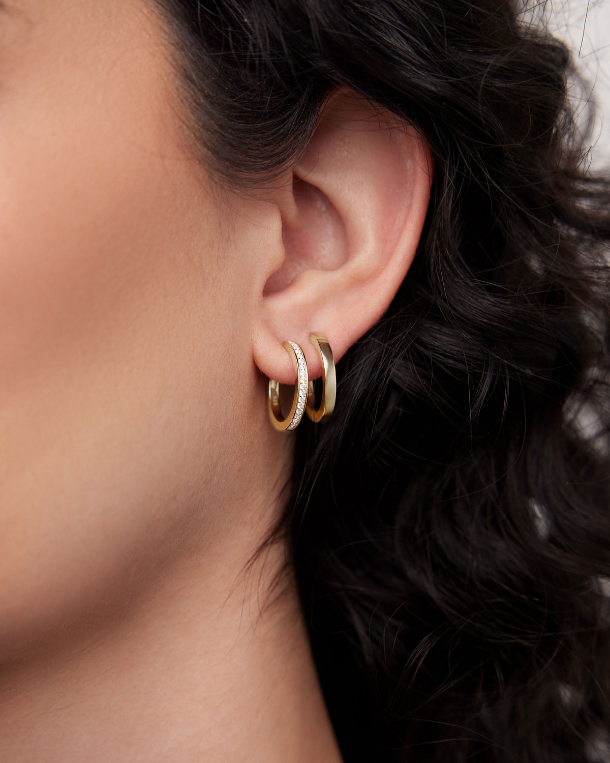 18k Huggie with Pavé Diamonds 18K gold earring - side view | diamond huggie earrings