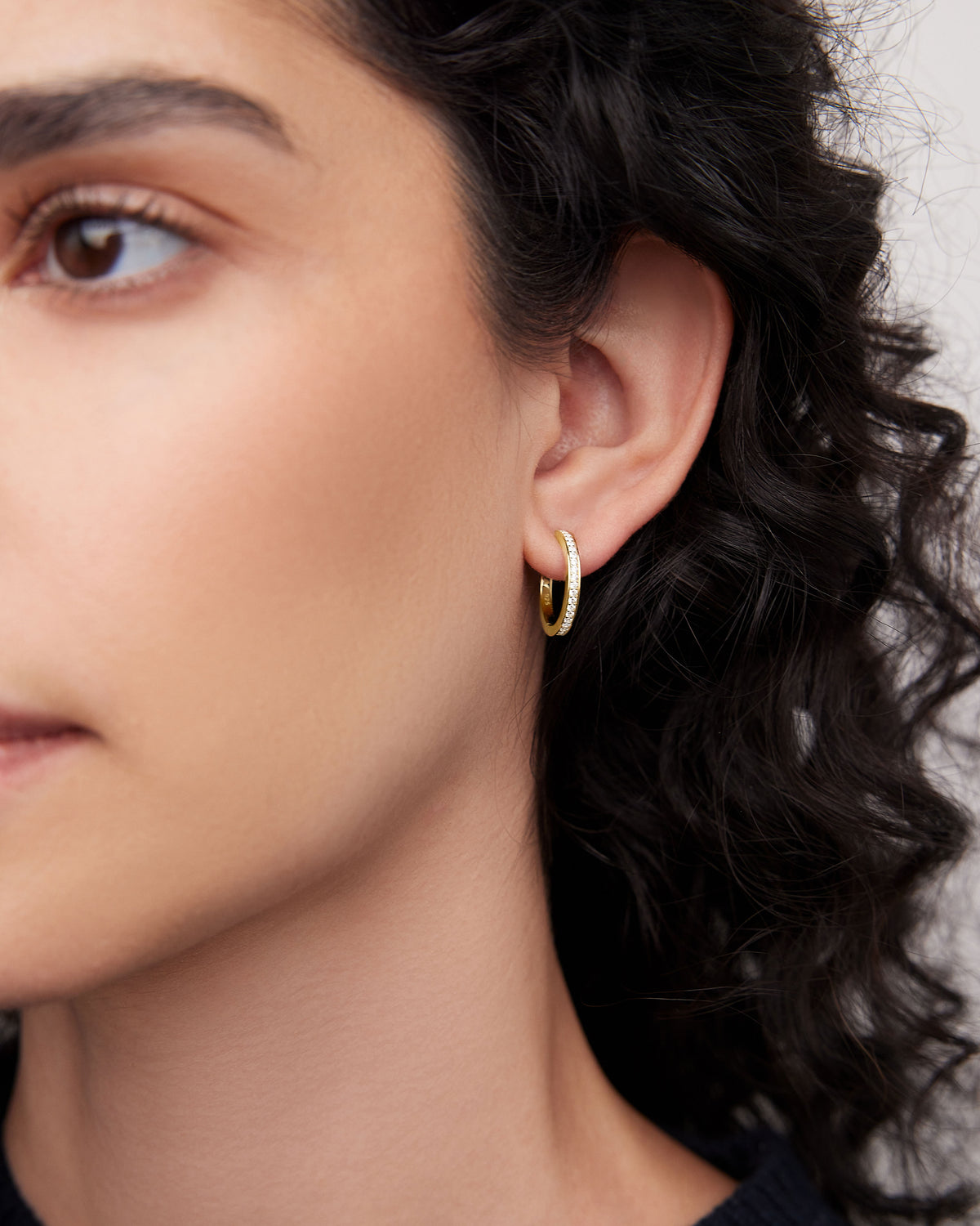 18k Huggie with Pavé Diamonds 18K gold earring - alternate angle | diamond huggie earrings