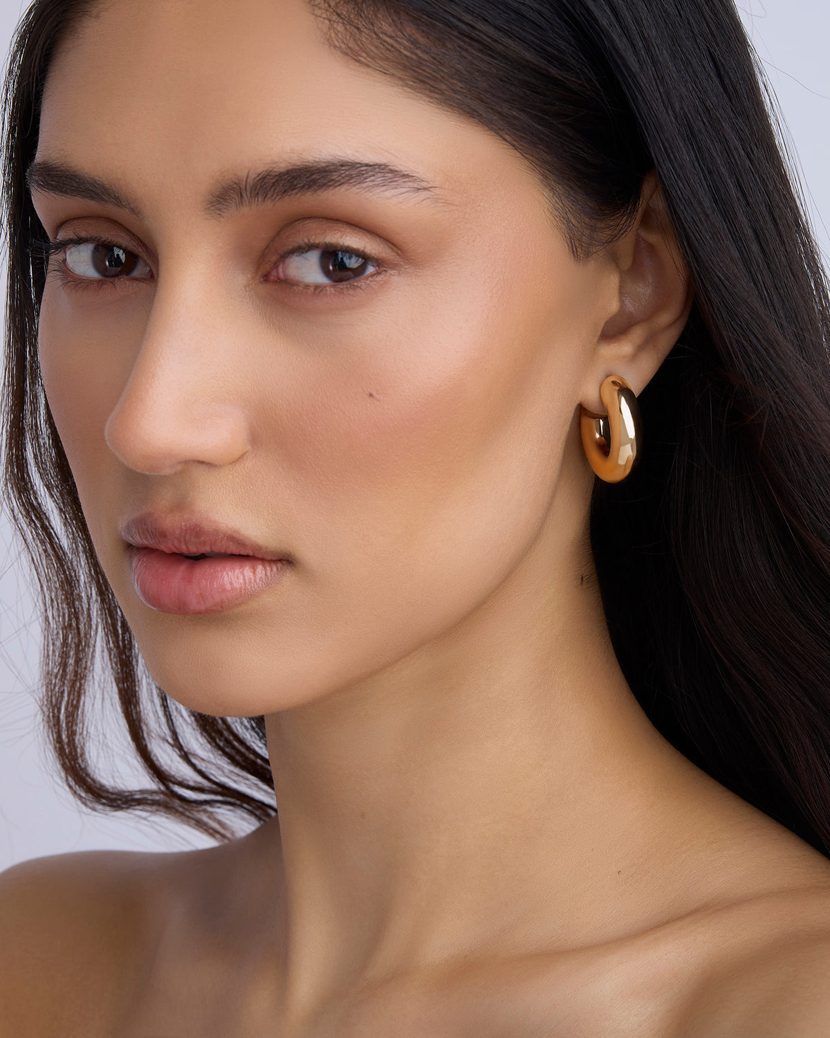 Jamma Micro Huggies earring - close-up detail | gold huggie earrings