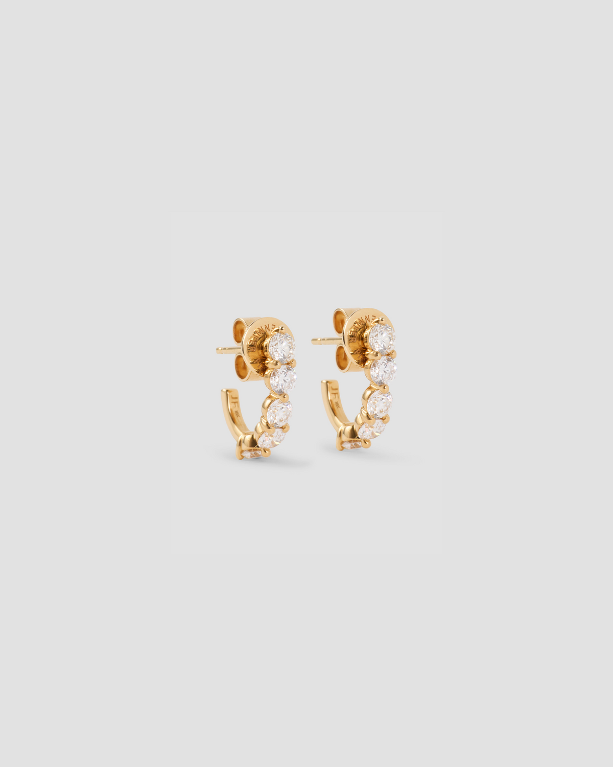 Floating Five Diamond Huggies 18K gold earring - front view | diamond huggie earrings