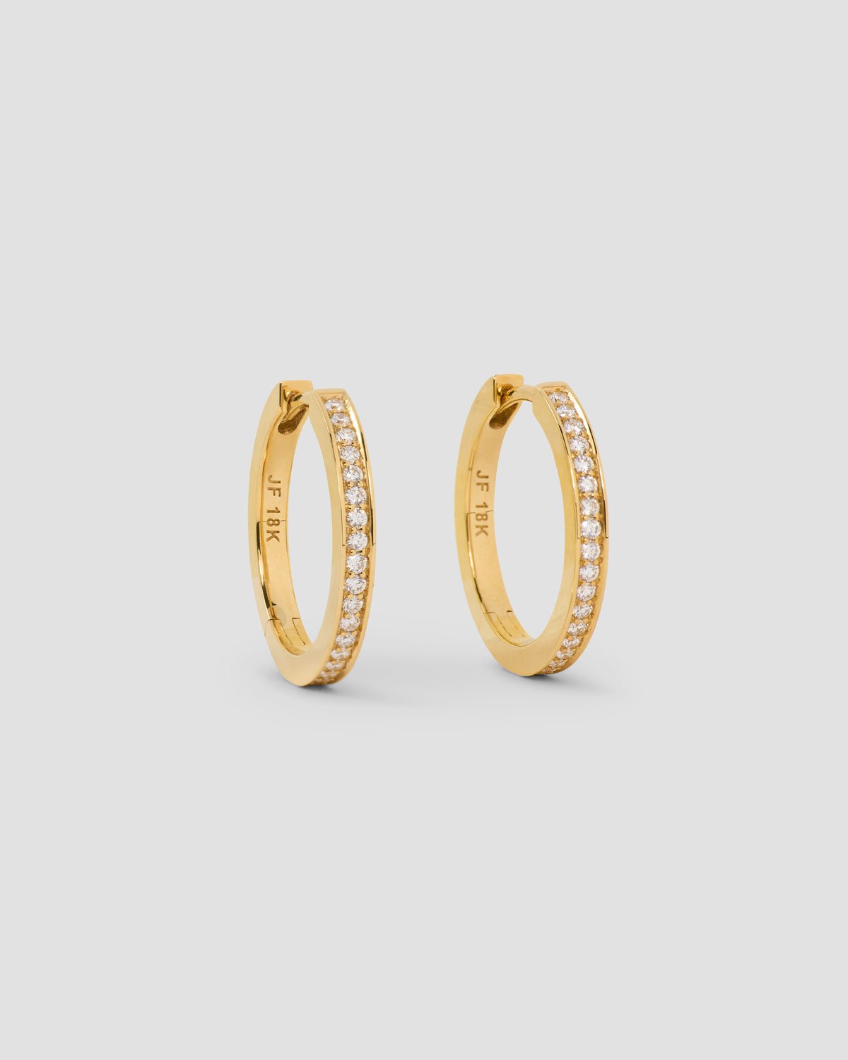 18k Huggie with Pavé Diamonds 18K gold earring - front view | diamond huggie earrings