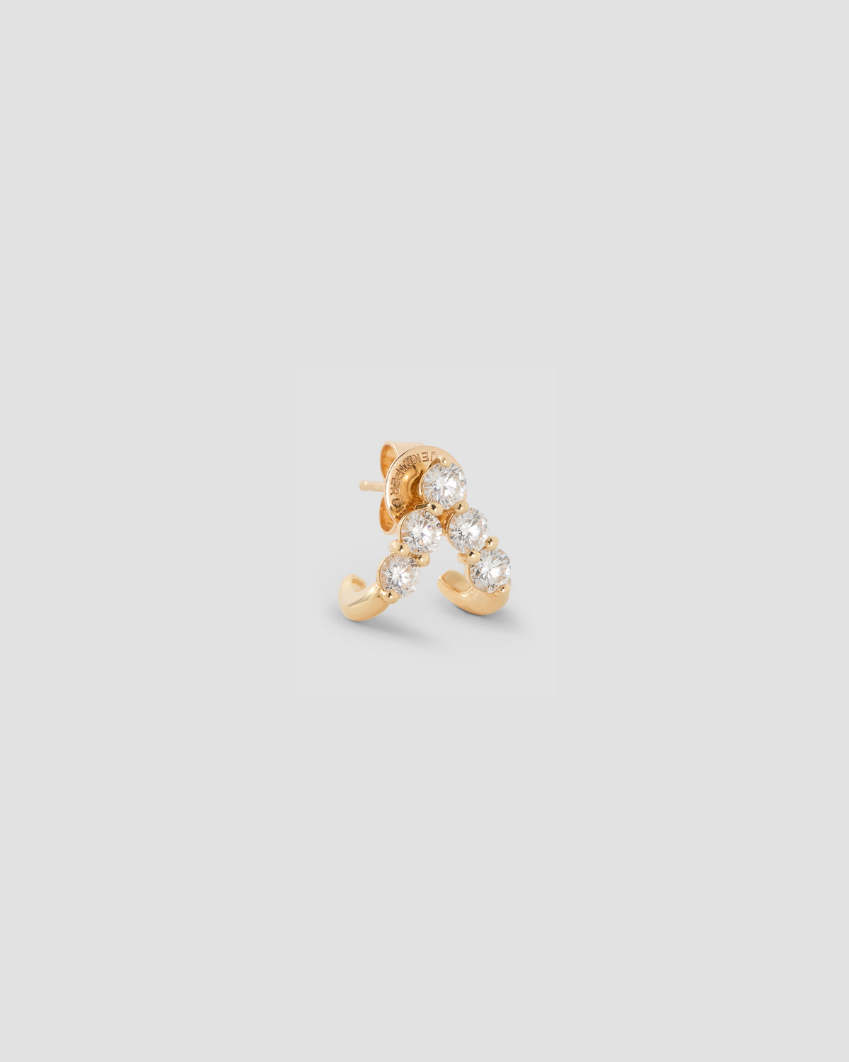 Floating Five Diamond Double Huggies 18K gold earring - worn look | diamond huggie earrings