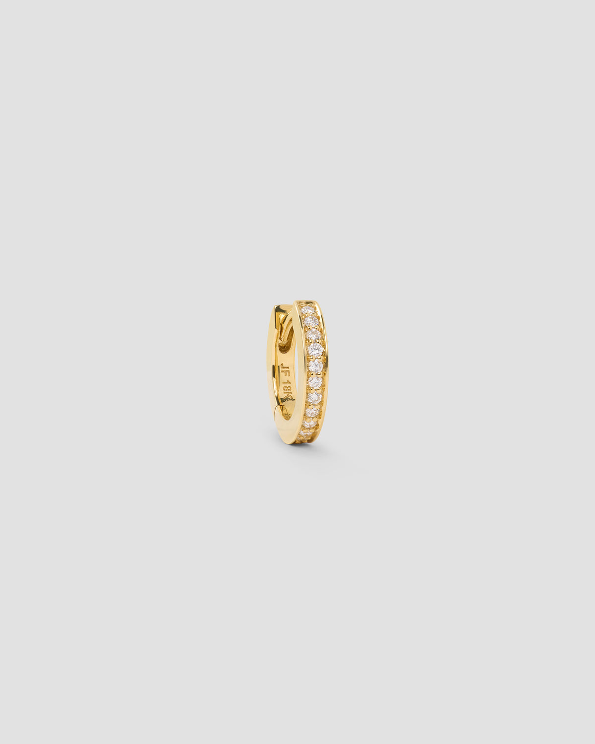 18k Extra Small Huggie with Pavé Diamonds 18K gold earring - styled on model | diamond huggie earrings