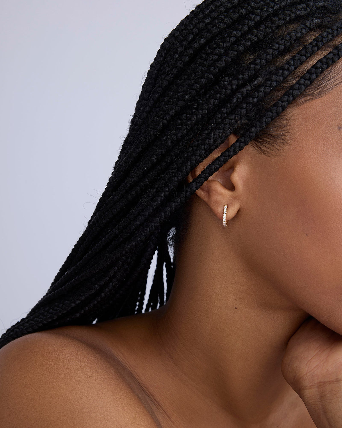 Small Pavé Diamond Level Earring in 18K Yellow gold earring - close-up detail | diamond huggie earrings
