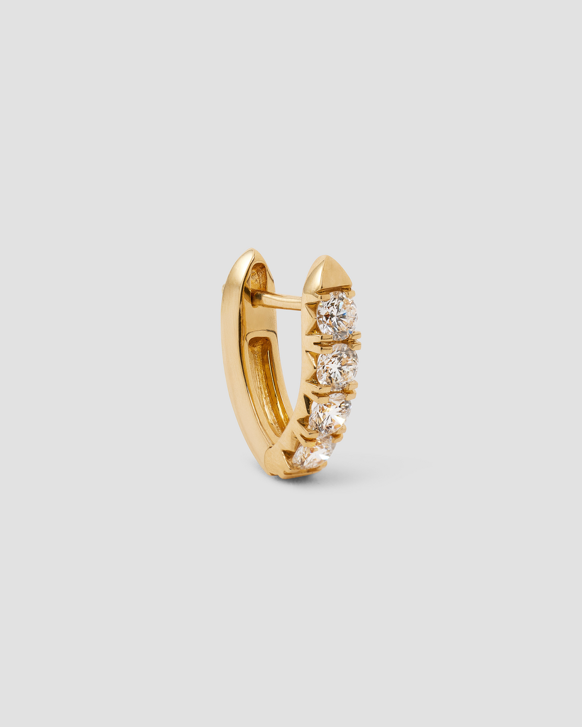 Lab Diamond Round Cut Huggie gold earring - styled on model | lab grown diamond earrings