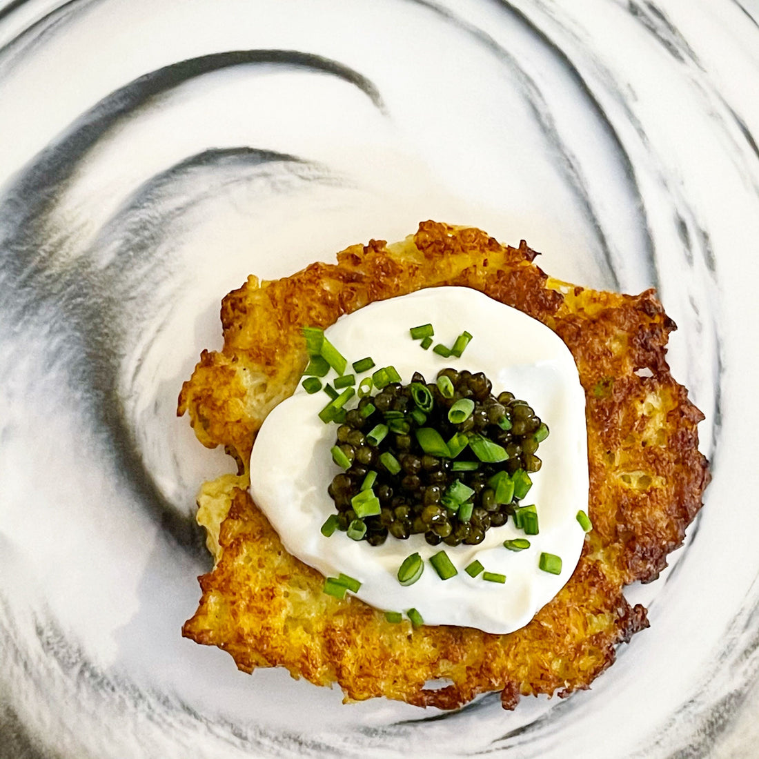 ‘YOU WON’T MISS THE POTATO’ CAULIFLOWER LATKES