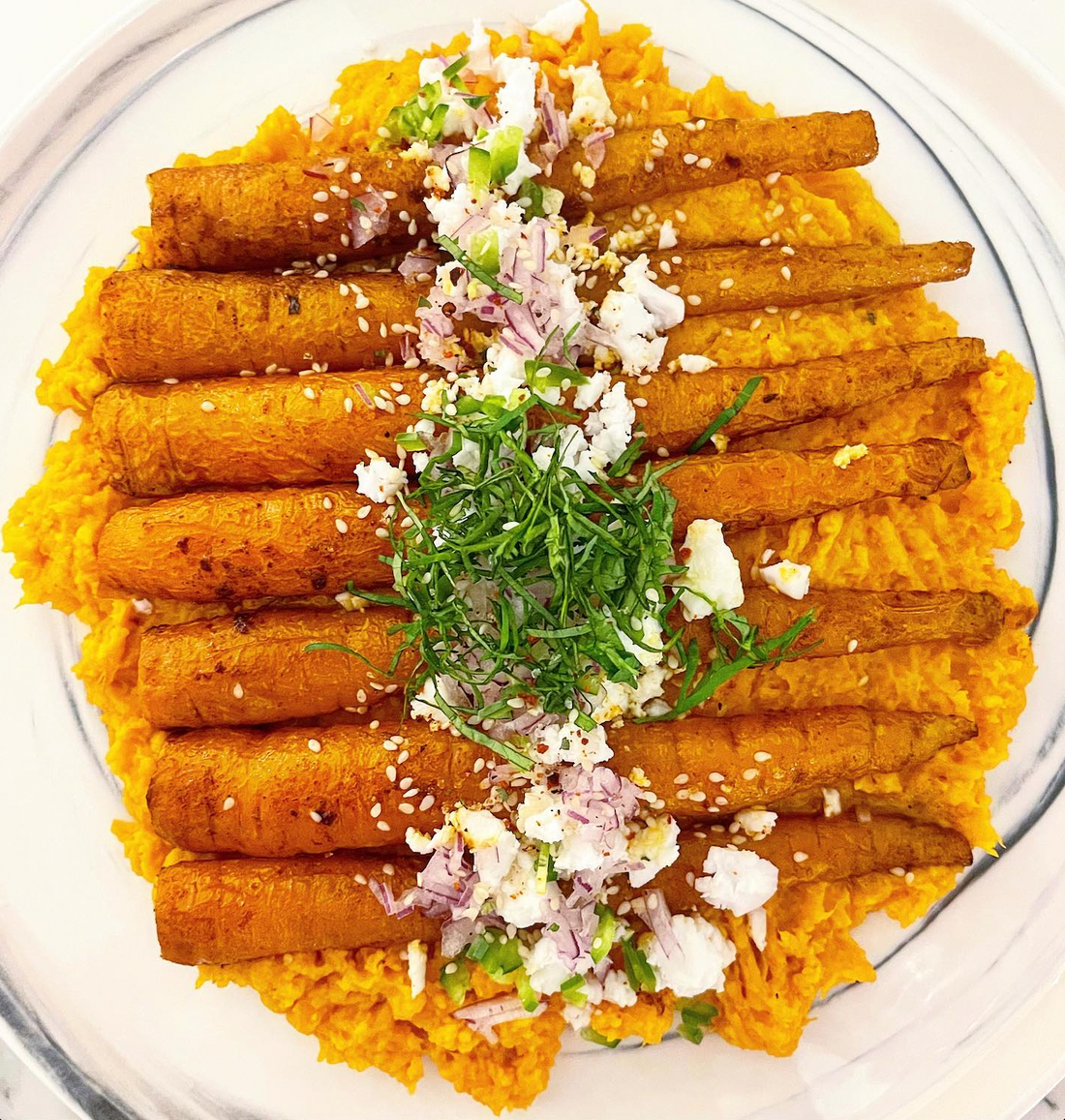 Moroccan Spiced Roasted Carrots Over Sweet Potato Mash