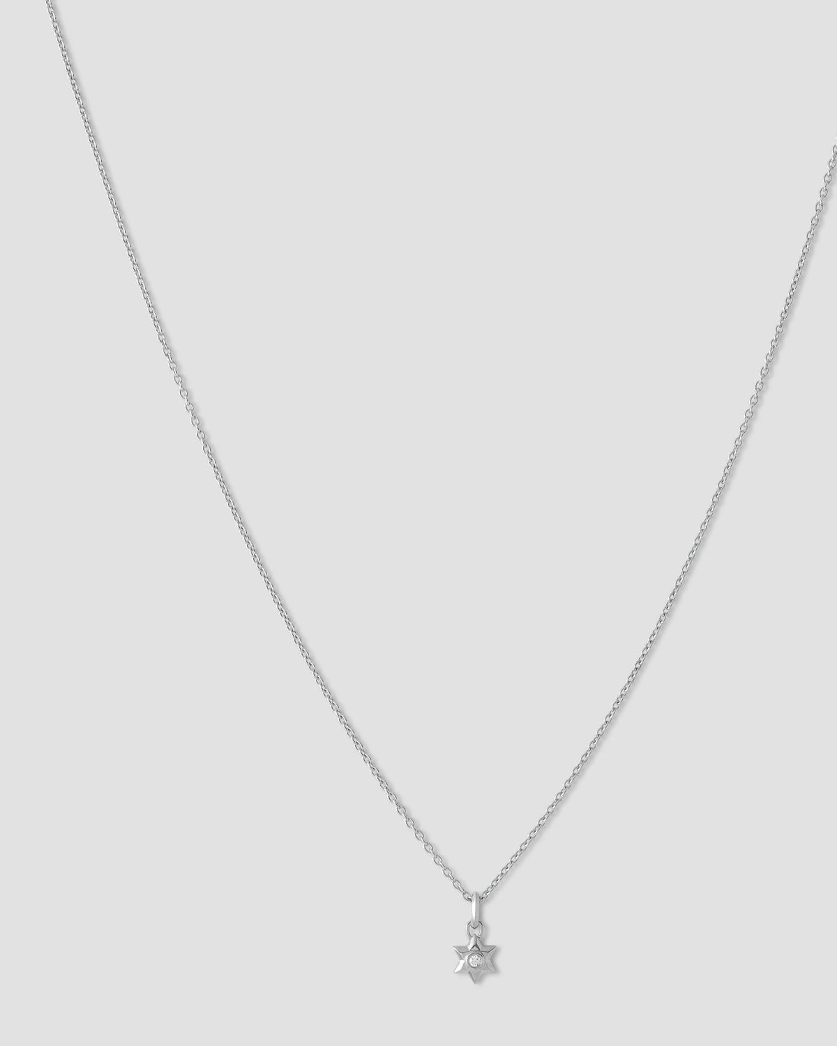 Star Of David Necklace gold charm - styled on model | charm necklaces