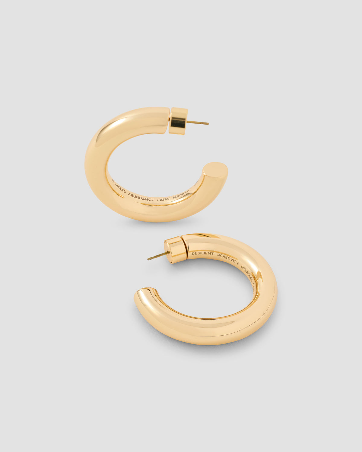 1" Gabrielle Manifest Mini Hoops earring - front view | small 14k gold hoop earrings
