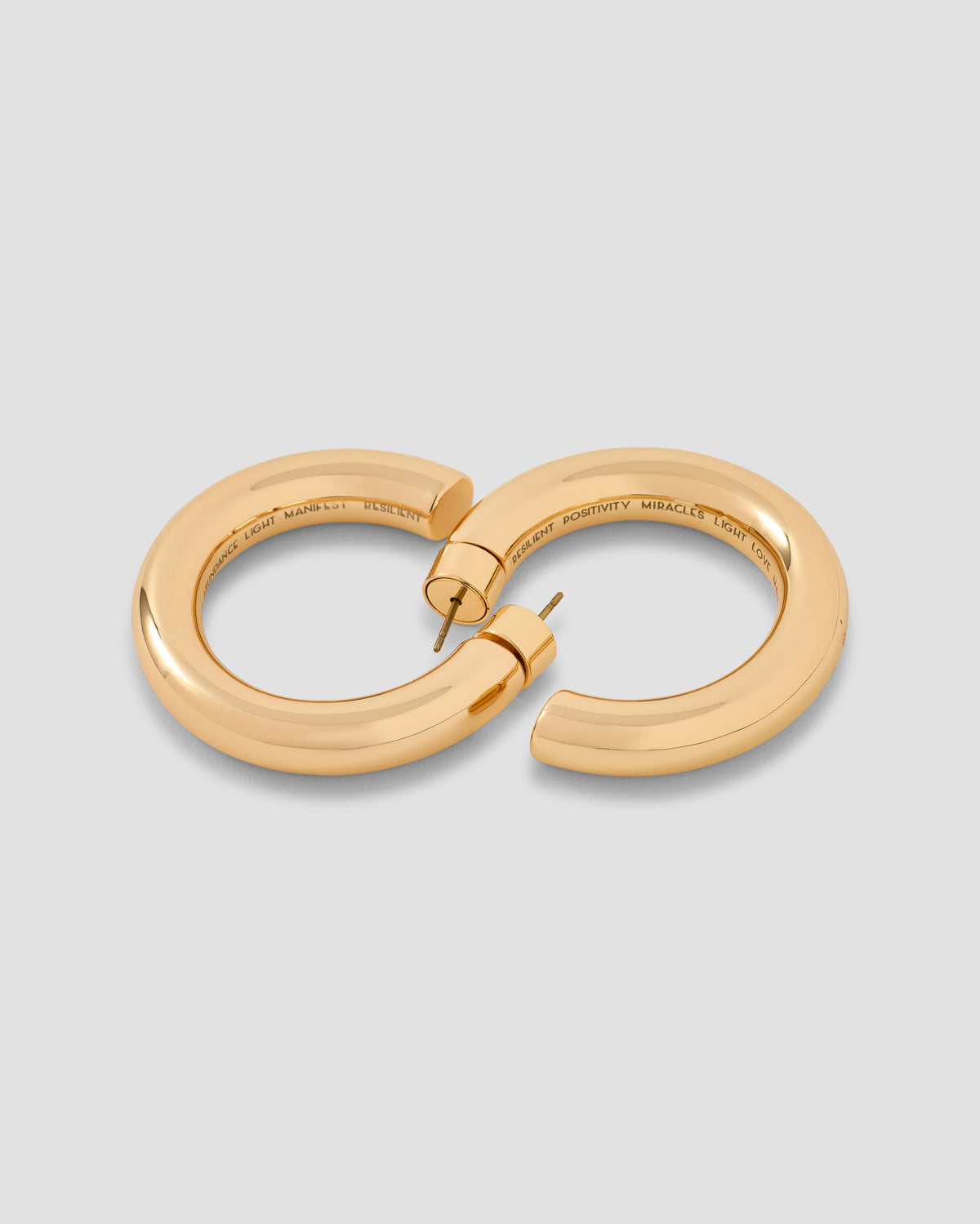 1" Gabrielle Manifest Mini Hoops earring - close-up detail | small 14k gold hoop earrings