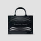 Black handbag with 'Jennifer Fisher' branding on a light gray background
