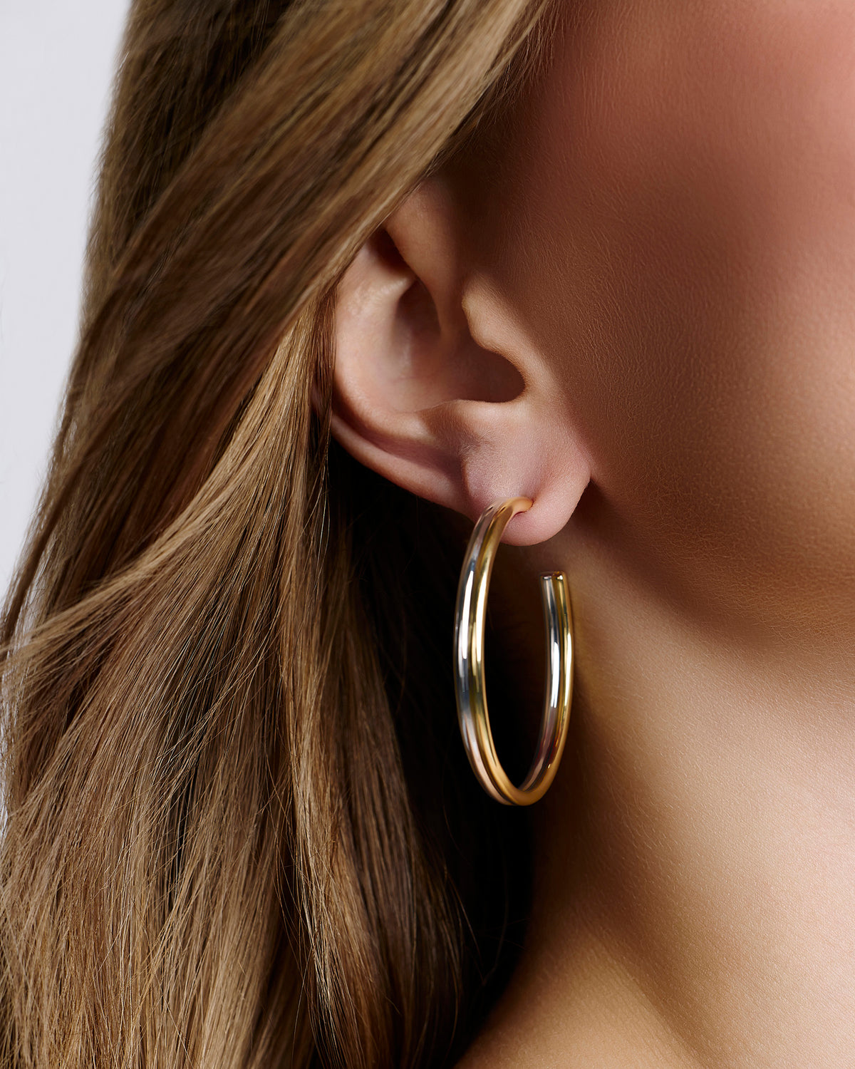 1.5" Two Tone Thread Baby Hoops gold earring - styled on model | hoop earrings