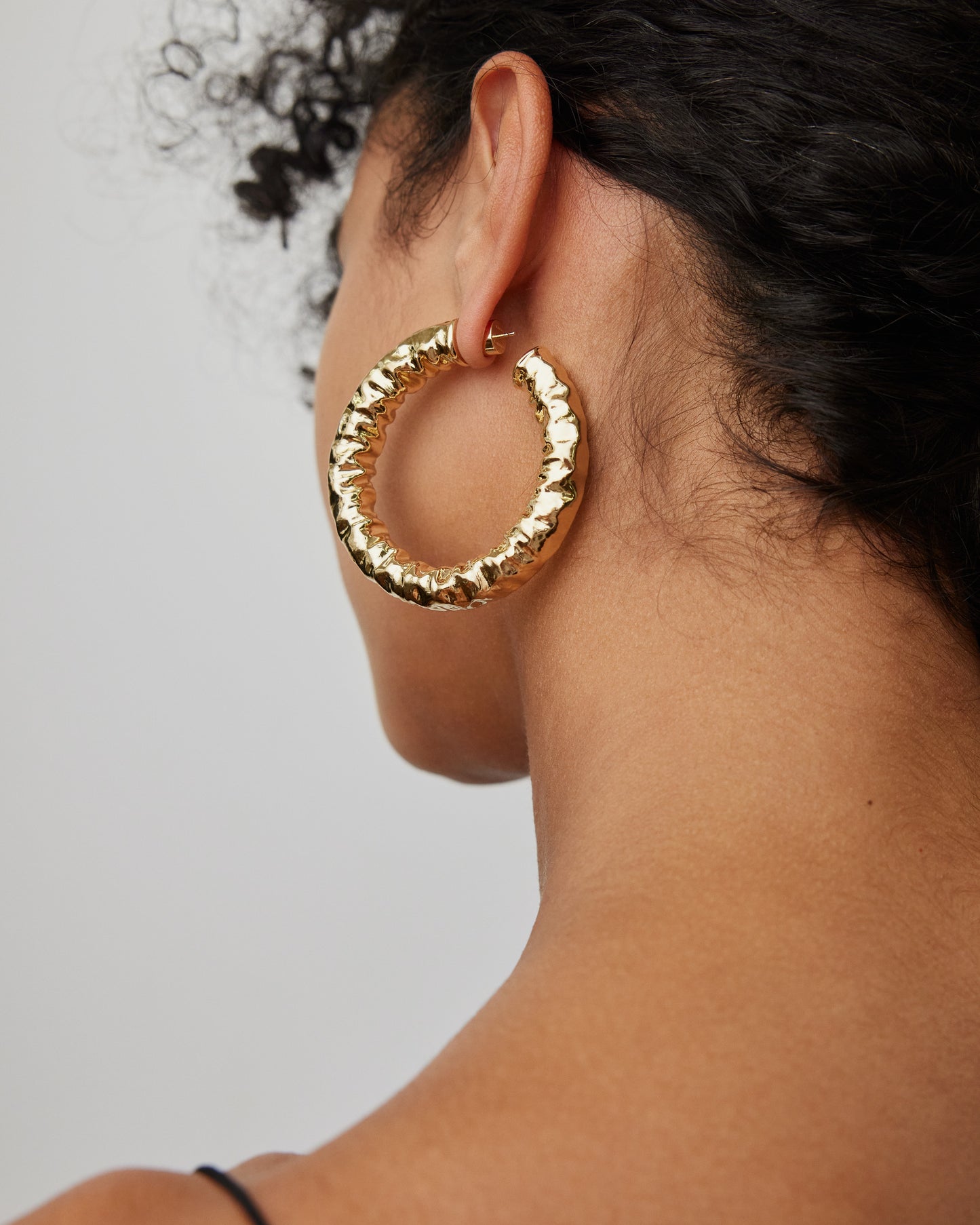  Jennifer Fisher - 1.5'' Maeve Baby Hoops on model - Yellow Gold