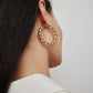  Jennifer Fisher - 1.5' Twisted Lilly Baby Hoops on model - Yellow Gold