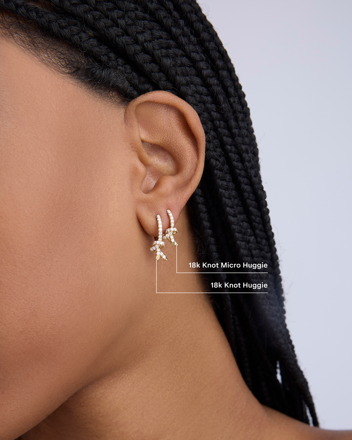 Knot Micro Huggie with Pavé White Diamonds gold earring - close-up detail | diamond huggie earrings