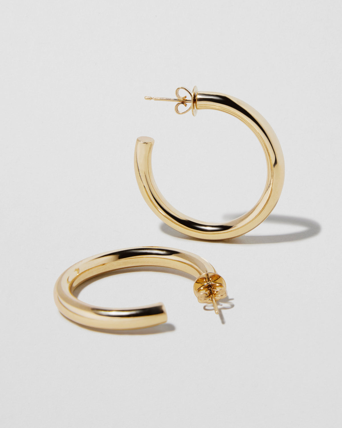 1" Mini Lilly Hoops in 14K Yellow Gold earring - close-up detail | gold small hoop earrings