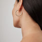  Jennifer Fisher - 1'' Lilly Mini Hoops on model - Yellow Gold