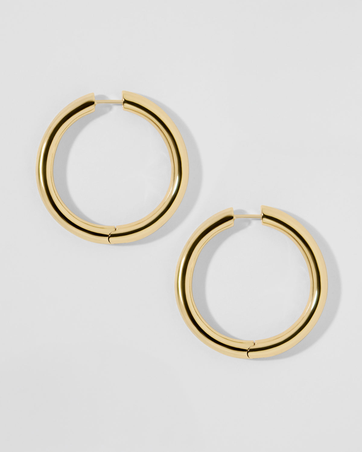 1" Lilly Hinged Mini Hoops earring - styled on model | gold small hoop earrings