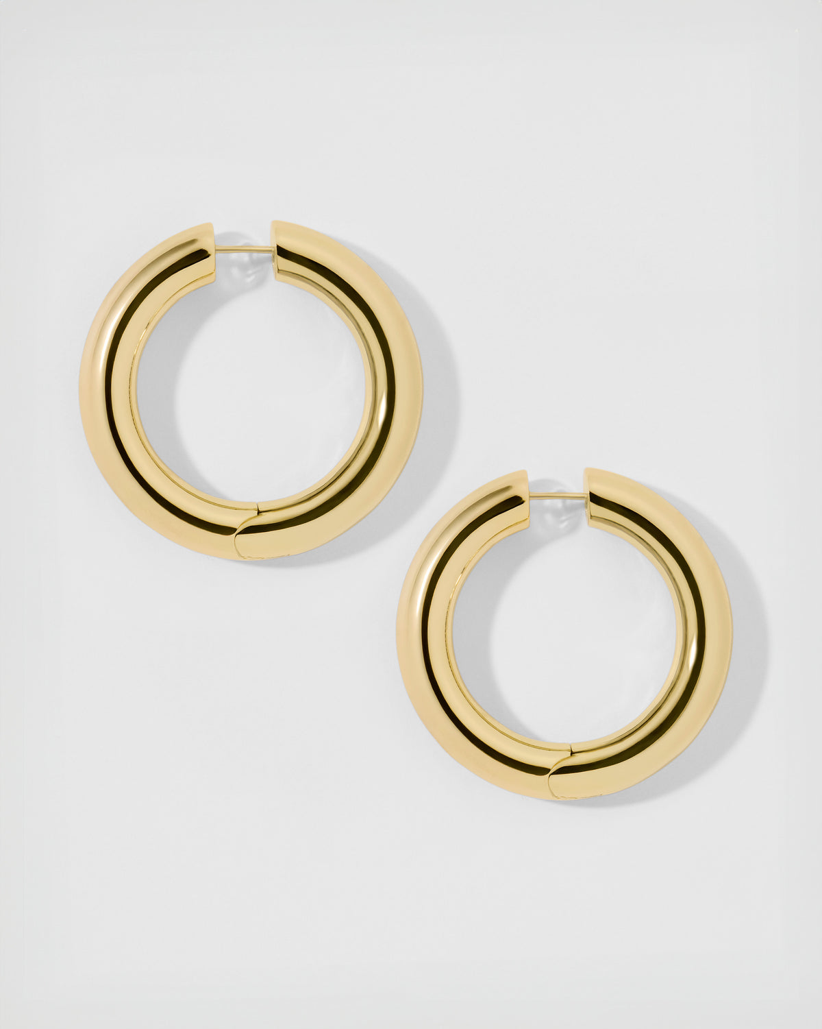 1" Samira Hinged Mini Hoops earring - close-up detail | gold small hoop earrings