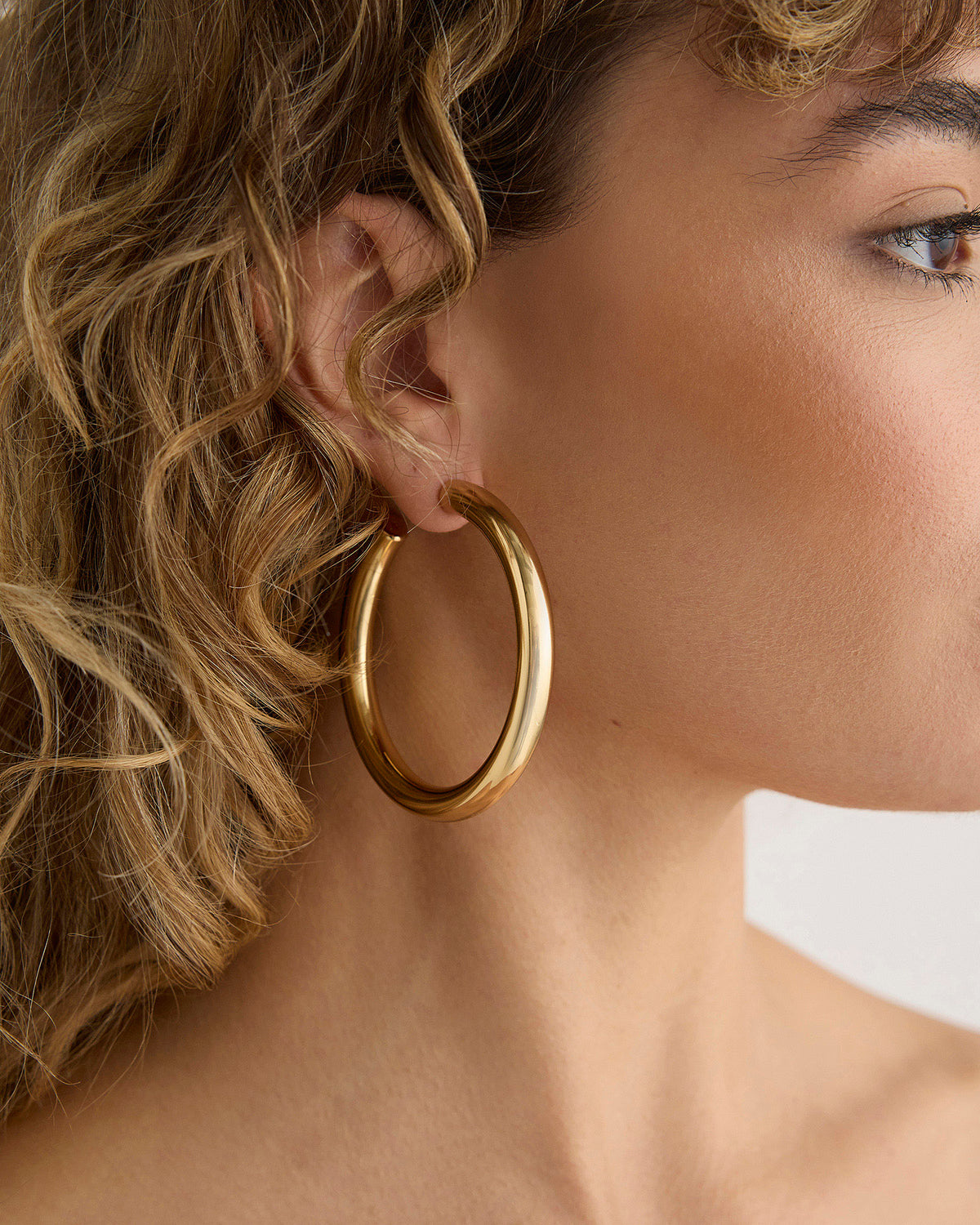 2" Samira Hoops gold earring - alternate angle | hoop earrings