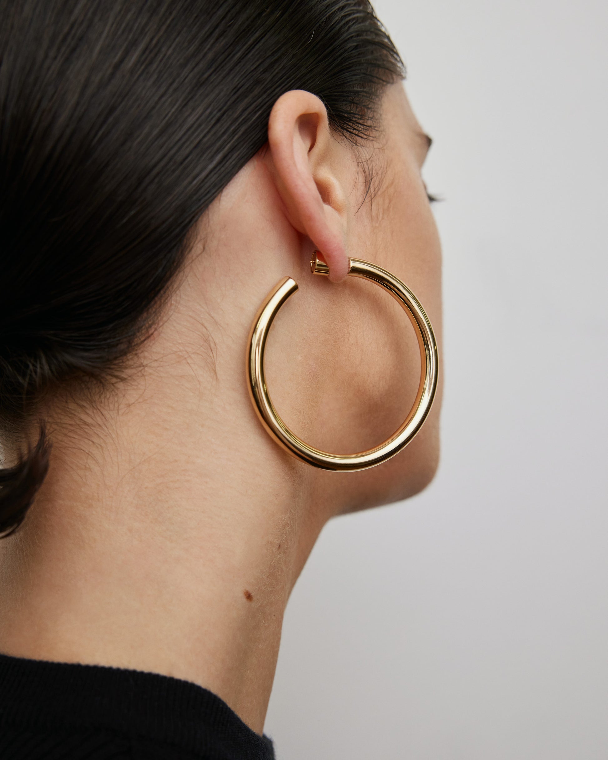 Jennifer Fisher - 2'' Fine Natasha Hoops - Yellow Gold on model