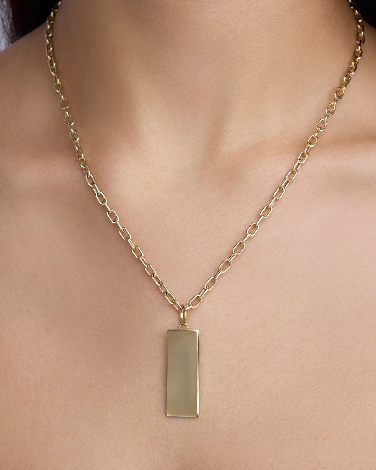 Classic Dog Tag in 18K Yellow Gold gold charm - close-up detail | charm necklaces