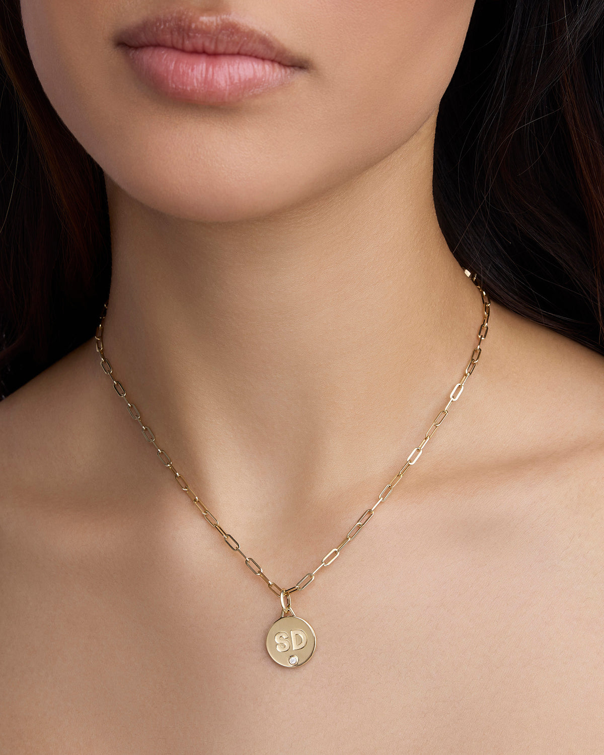 Personalized Small Circle with Diamond in 18K Yellow Gold 18K gold charm - close-up detail | custom charm necklace