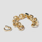 Bracelet on grey background with link off. 