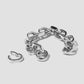 Bracelet on grey background with link off. 