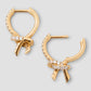 Knot Huggie in 18K Gold with Pavé White Diamonds