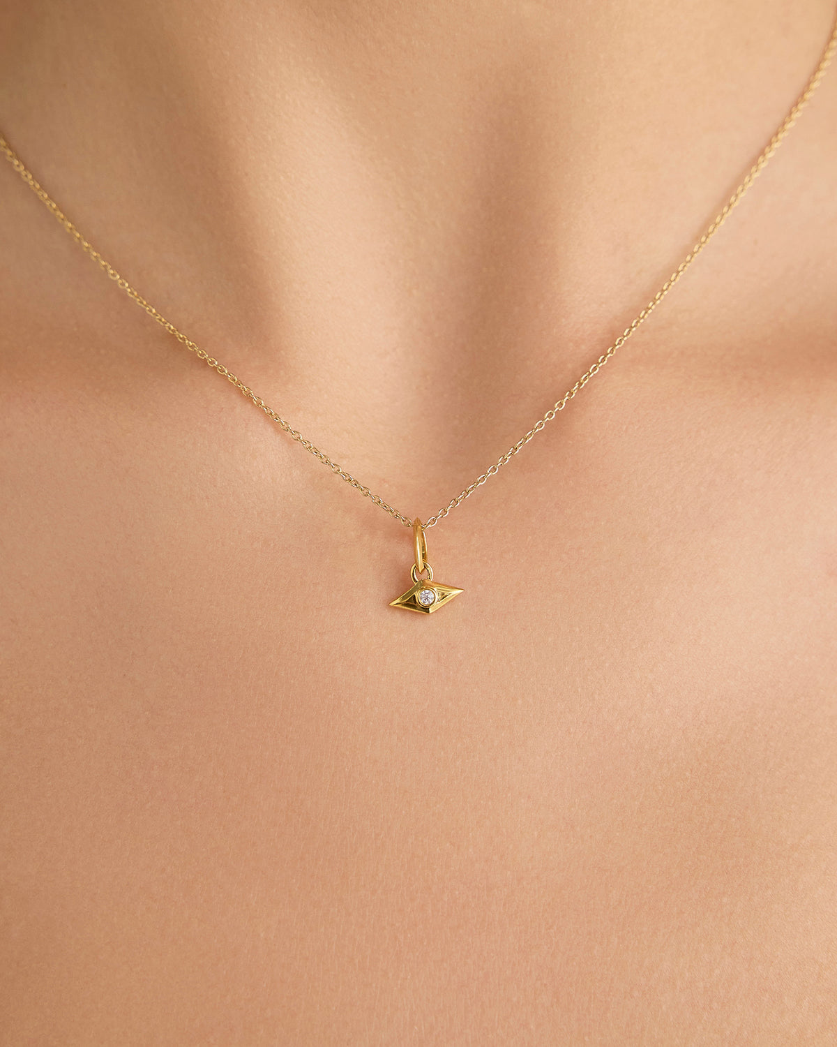 Evil Eye Necklace gold charm - close-up detail | necklace with charms