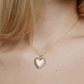 Image of model wearing the plain Fierce Heart charm on a chain