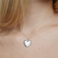 Image of model wearing the plain Fierce Heart charm on a chain