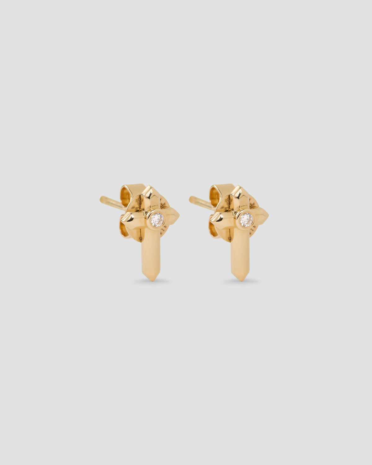 Cross Stud gold earring - front view | diamond stud earrings