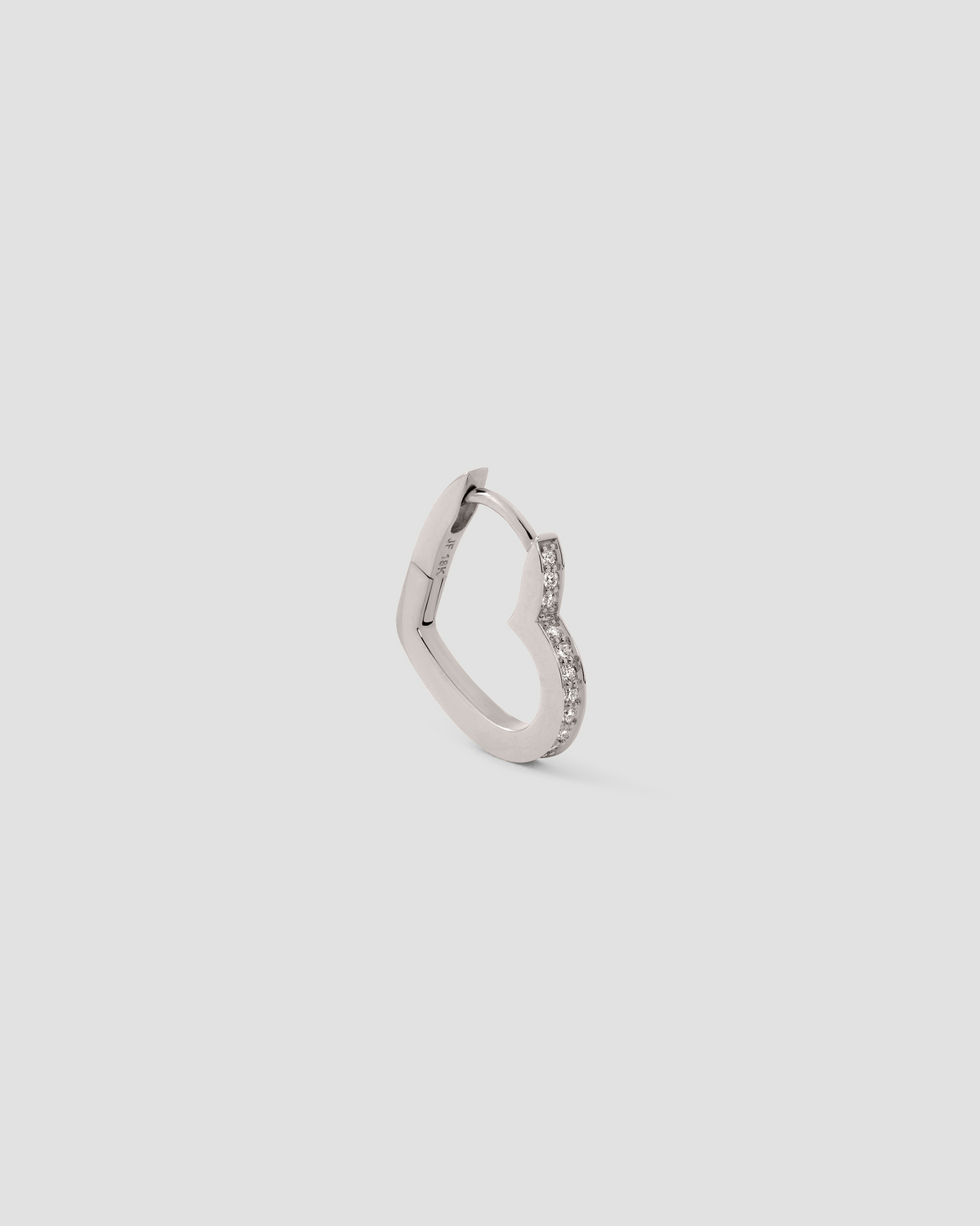 18k Small Heart Huggie With Pavé White Diamonds gold earring - close-up detail | diamond huggie earrings