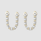 Diamond earrings on grey background