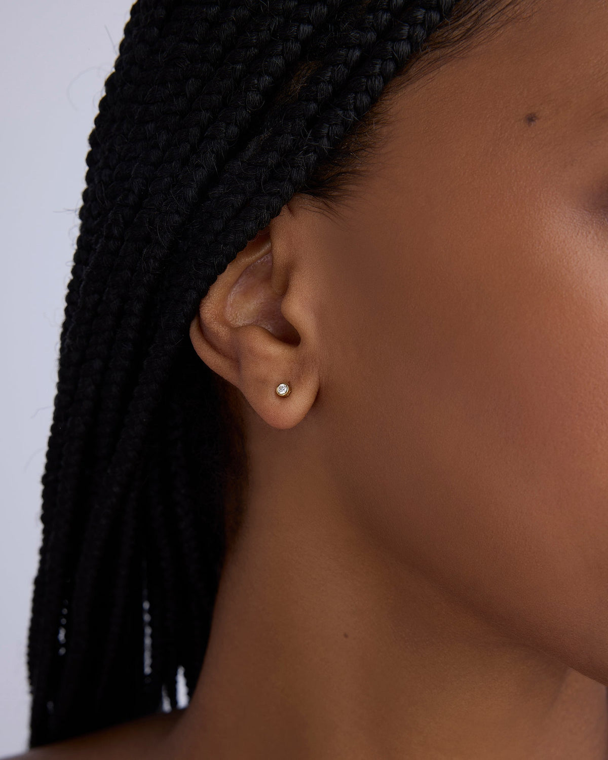 Diamond Stud Earring in 18K Yellow Gold earring - close-up detail | diamond stud earrings