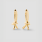 Knot Huggie in 18K Yellow Gold