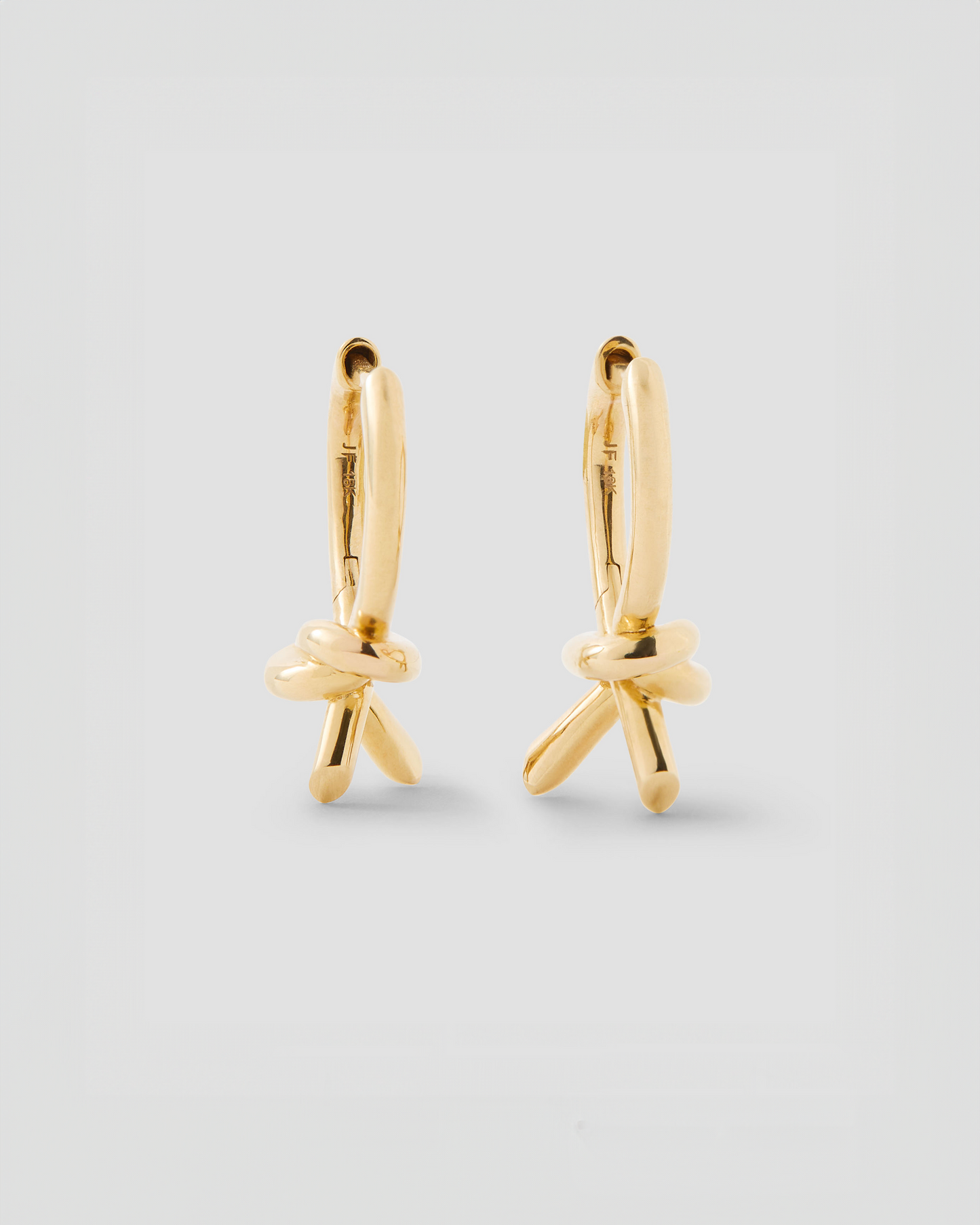 Knot Huggie in 18K Yellow Gold